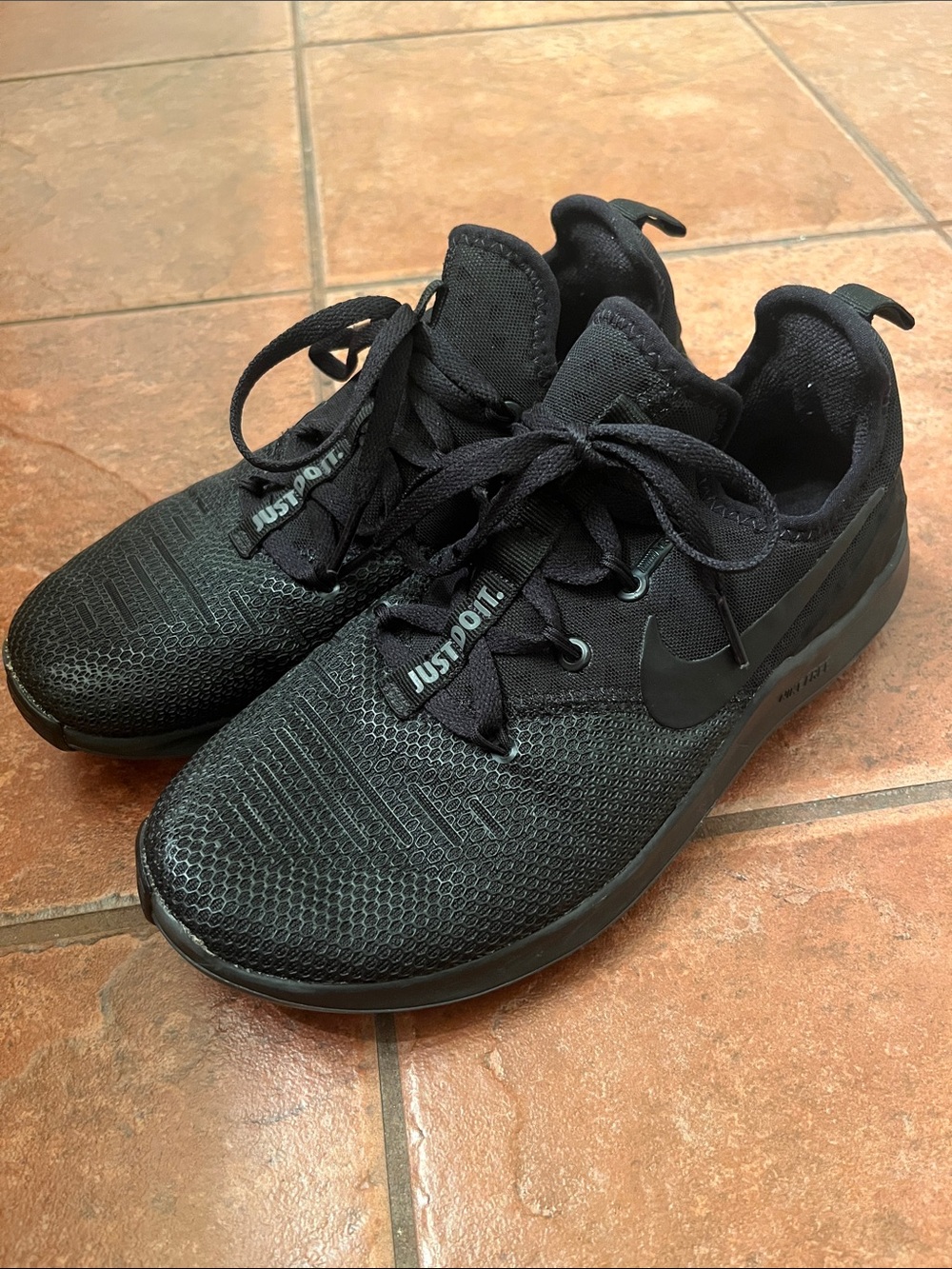 Nike Women’s Black Athletic Running Shoes with Subtle Teal Accents